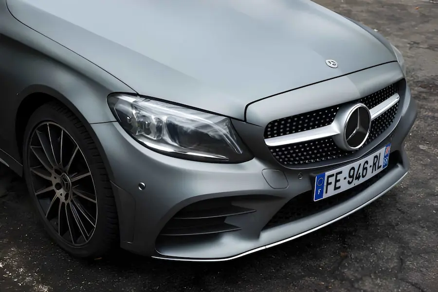 Professional car detailing on a matte grey Mercedes-Benz by Neighbors Mobile Detailer in Austin, TX.